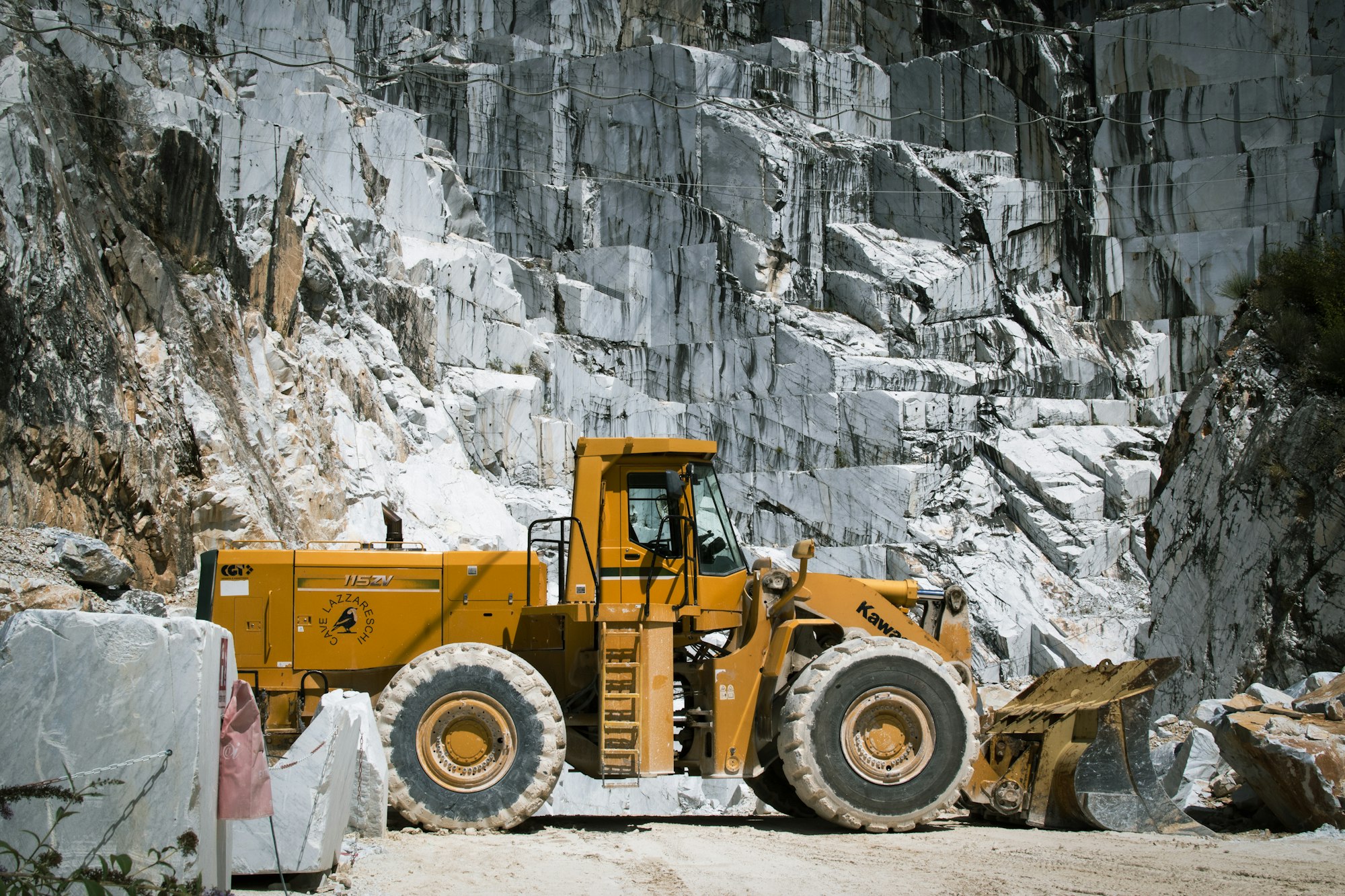 Loader at a quarry rock face